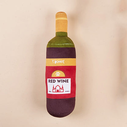 Petkin Wine Bottle Squeaky Dog Toy isolated on white background showing front label