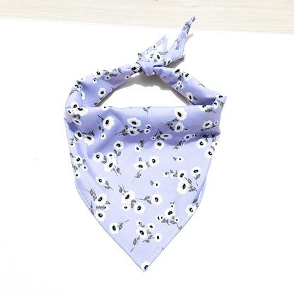 Close-up of Furbud floral pet bandana showing pink fabric with white flower pattern