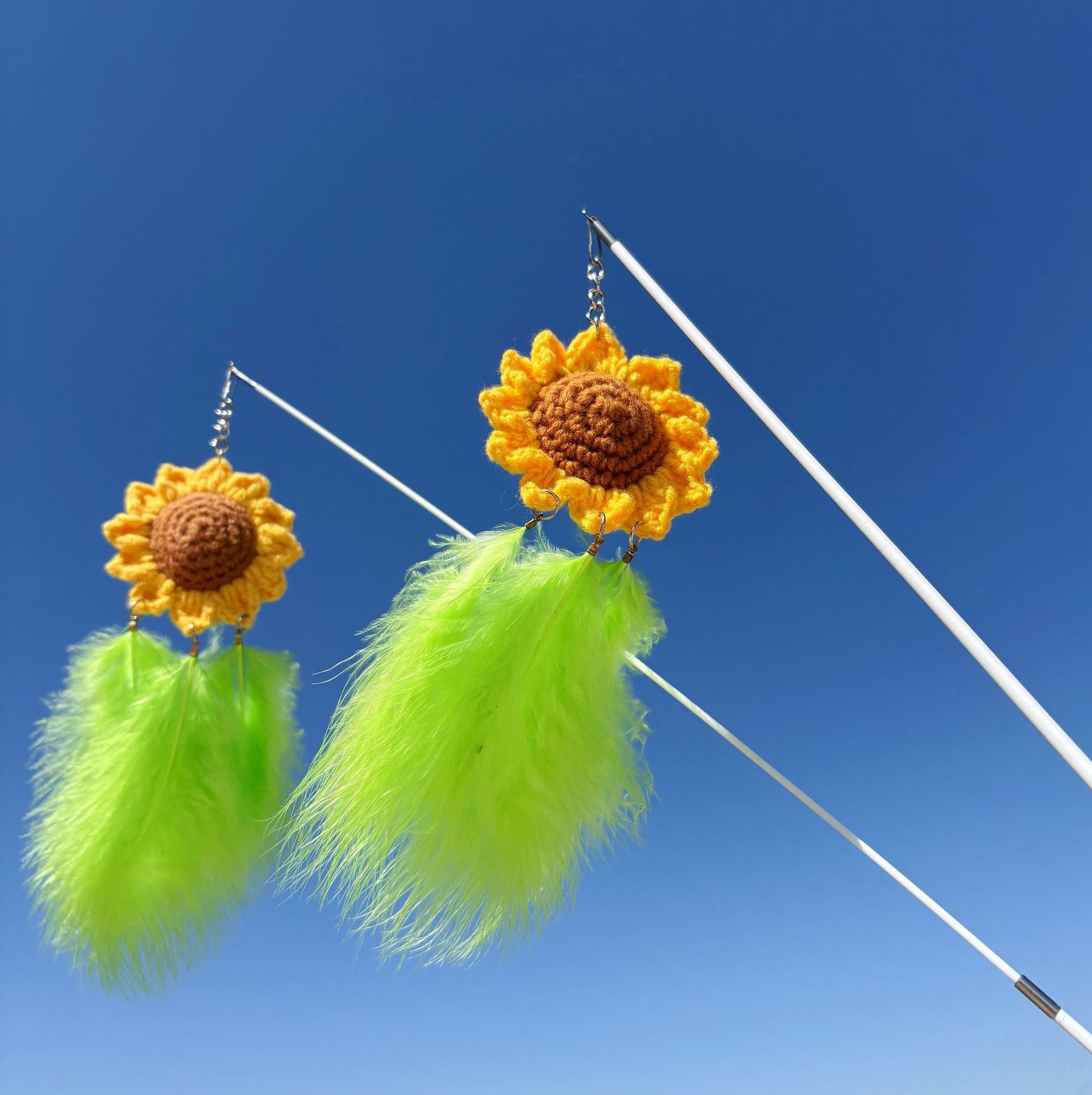 Moo Sunflower Feather Bouquet Wand Cat Toy with yellow sunflower and colorful feathers on a wand