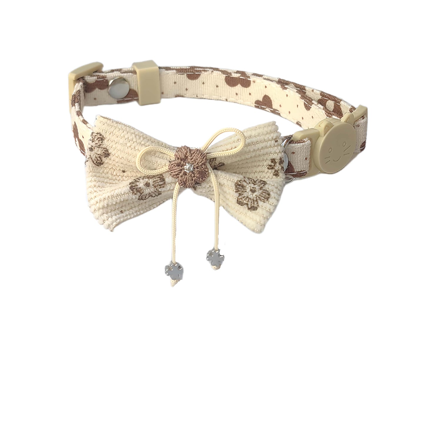 Mokka bow cat collar with floral charm next to matching pet accessories
