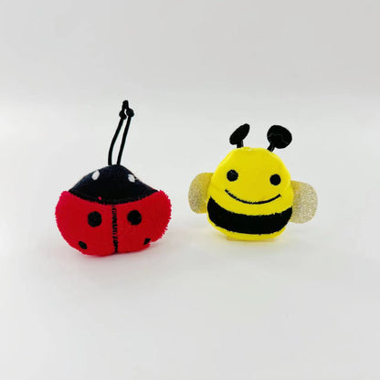 Moo plush insect cat toy in packaging with product label visible