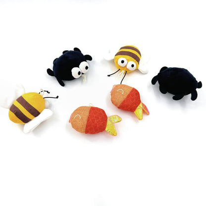 Moo animal-shaped cat toy in cow shape with visible facial details