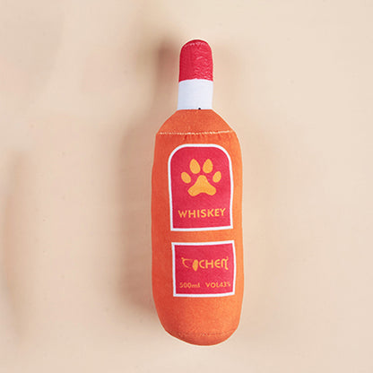 Petkin Wine Bottle Squeaky Dog Toy with green top and red body on white background