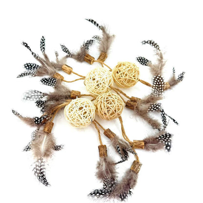 Natural rattan cat toy balls with attached feathers and silvervine for interactive play