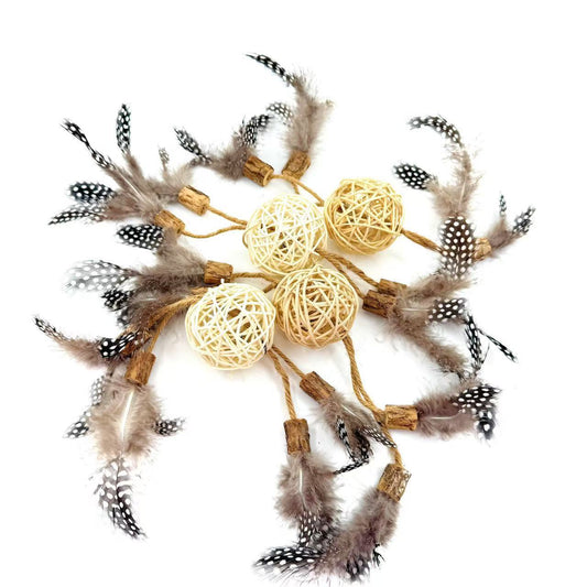 Natural rattan cat toy balls with attached feathers and silvervine for interactive play