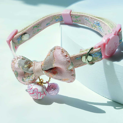 Mokka adjustable kimono bow tie cat collar displayed on dark background