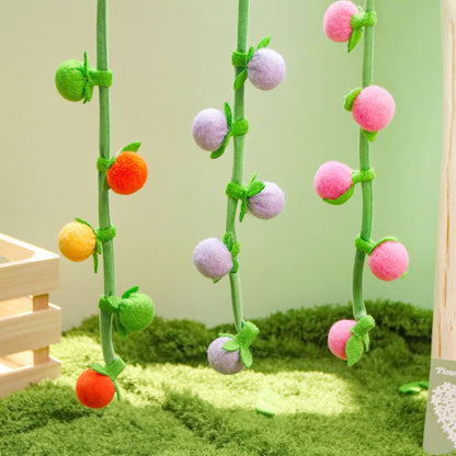 Moo hanging fruit vine cat toy with bright fruit shapes arranged along the vine