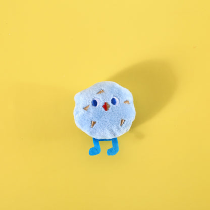 Bread cat toy shaped like a slice of bread with a cat face