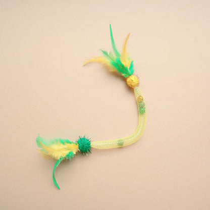 Moo Sparkle Feather Toss cat toy displayed on a white background