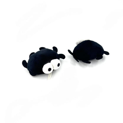 Moo animal-shaped cat toy displayed from a side angle showing cow features