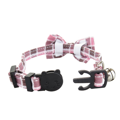Close-up of breakaway safety buckle on Mokka adjustable gingham bow tie cat collar