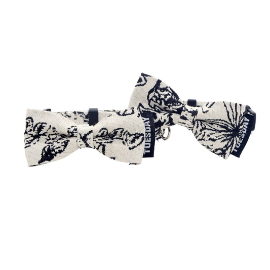 Close-up of the black and white bow on the breakaway cat collar