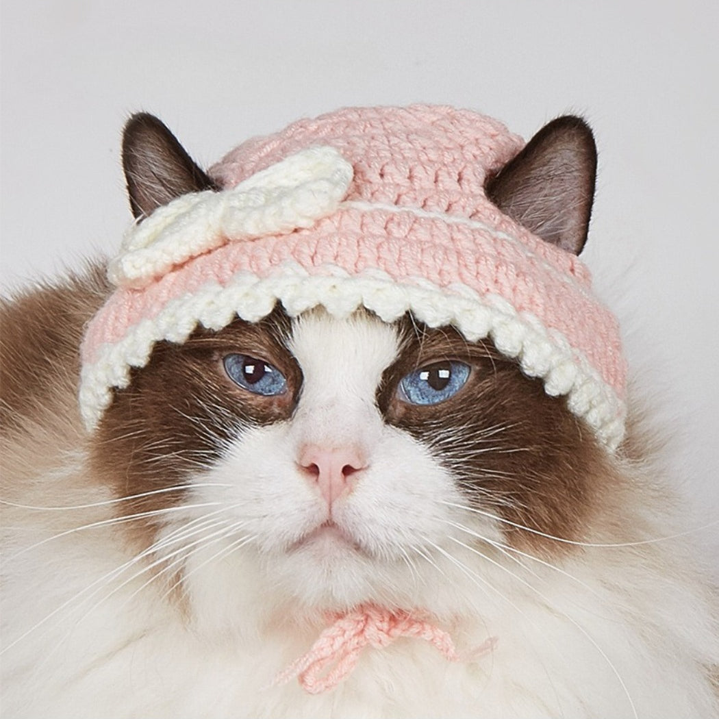 Close-up of Ozzie pink crochet cat hat showing detailed stitching