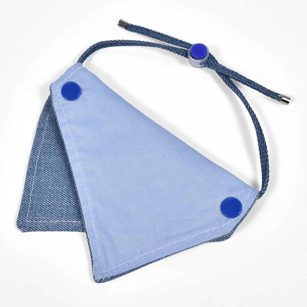 Mokka cat lying down with button detail bandana around neck