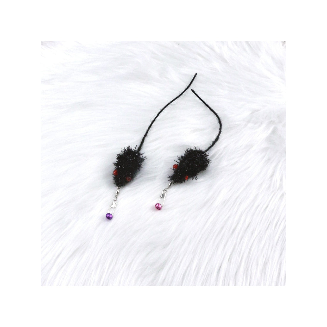 Close-up of Moo mouse refill attachment for teaser wands with detailed texture