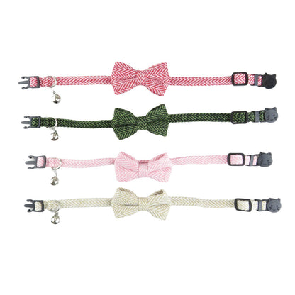 Mokka herringbone bow tie cat collar coiled in a circle on white background