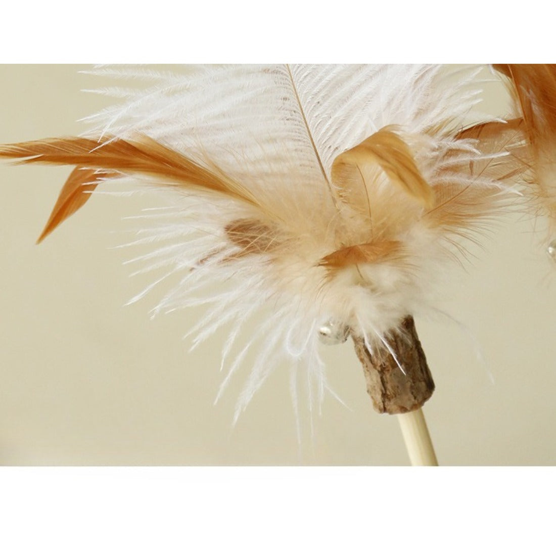 Moo Interactive Feather Wand Cat Toy shown with feathers fanned out