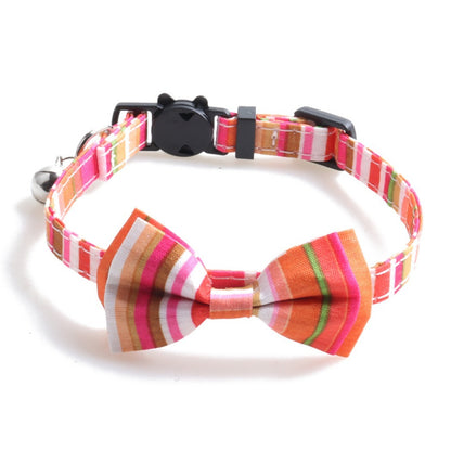 Close-up of Mokka rainbow stripe bow tie cat collar showing adjustable strap
