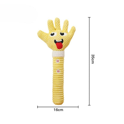 Petkin plush dog toy held in hand to show size and texture