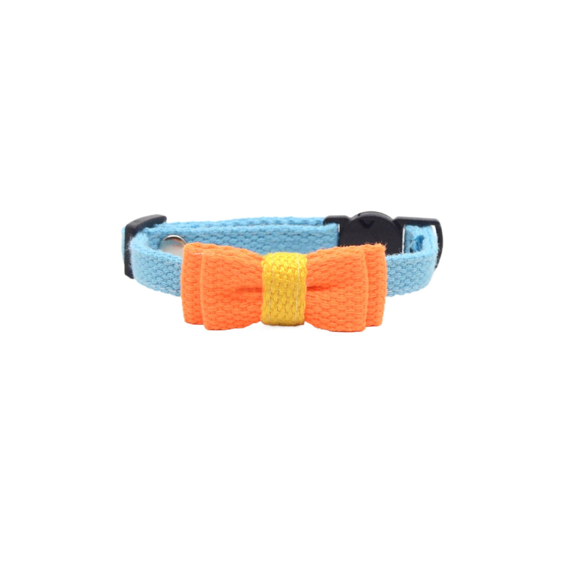 Mokka cat collar with textured bow next to matching pet accessories