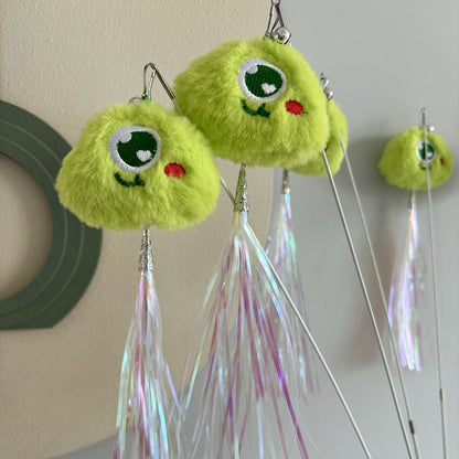 Moo telescopic pom figure cat toy wand partially extended on plain background