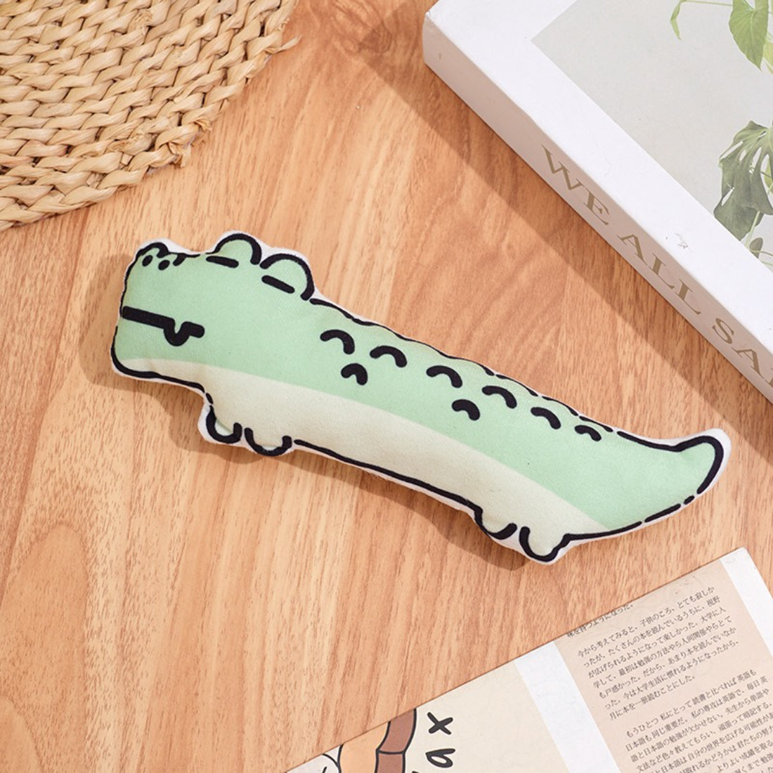 Side view of Moo animal plush cat toy highlighting its soft texture and playful design