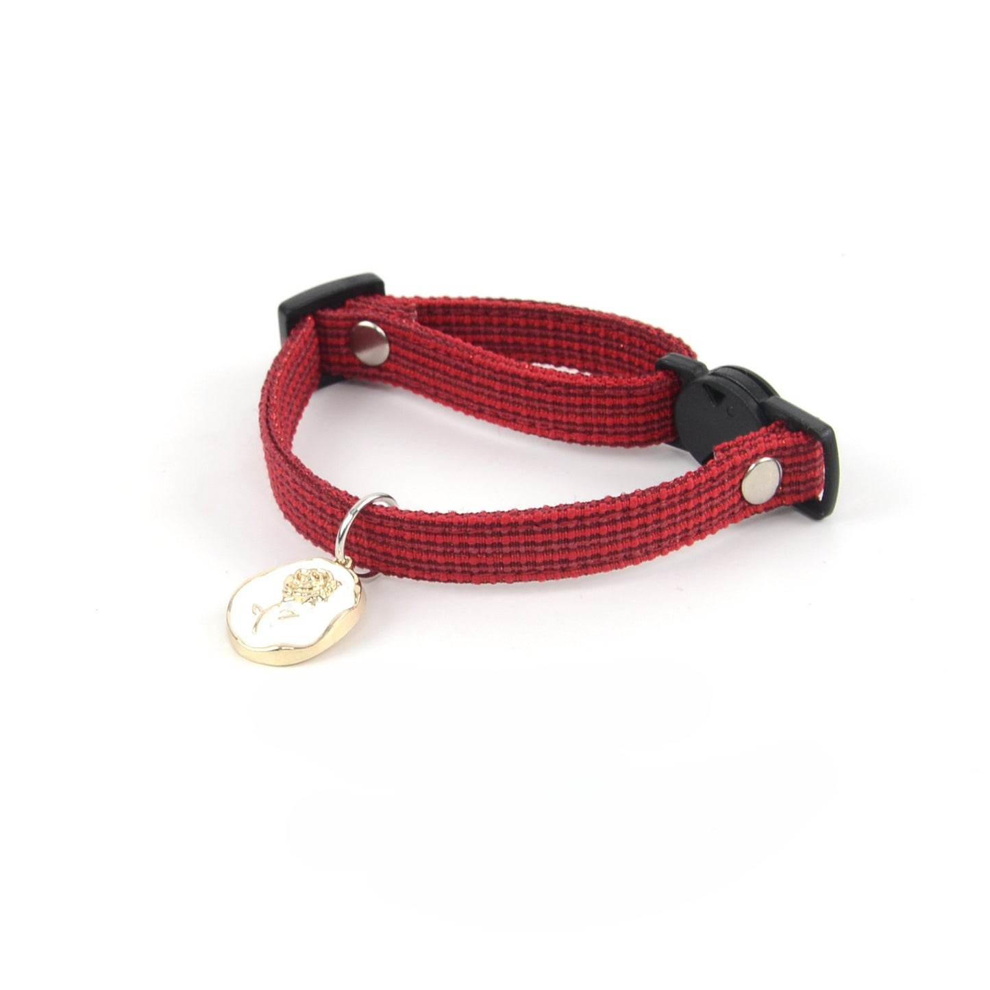 Mokka cat collar with rose charm shown unclasped on white surface