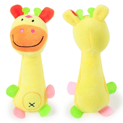 Petkin squeaky plush dog toy lying on a white surface with visible tail and ears