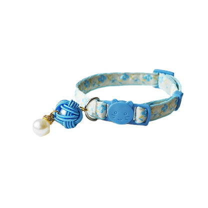 Mokka Pearl Flower Cat Collar displayed with pearl flower centerpiece