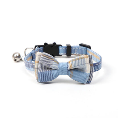 Mokka checkered bow tie cat collar laid out showing full length and adjustable strap details