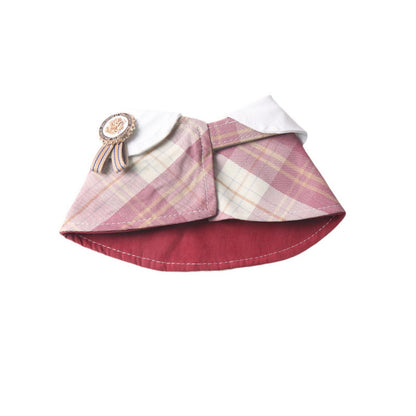 Side view of Mokka plaid rosette cape collar on a small dog