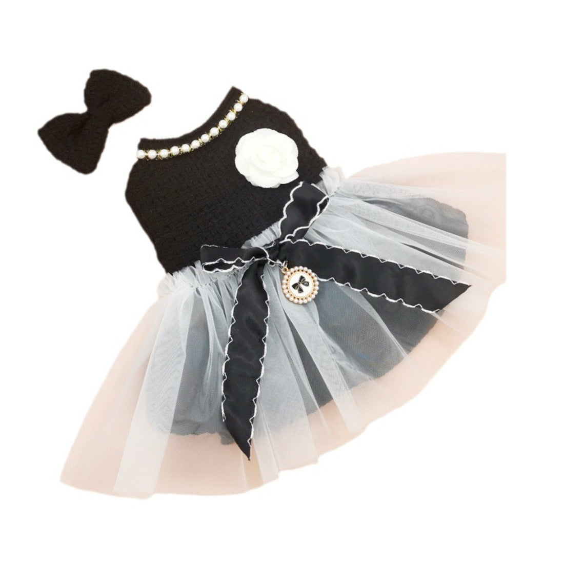 Ozzie pet dress displayed on small dog, showing fit and style