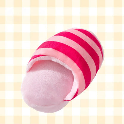 Side view of Petkin striped slipper plush dog toy highlighting its slipper shape