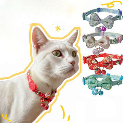 Mokka Bow Charm Cat Collar with Bell displayed on a white background