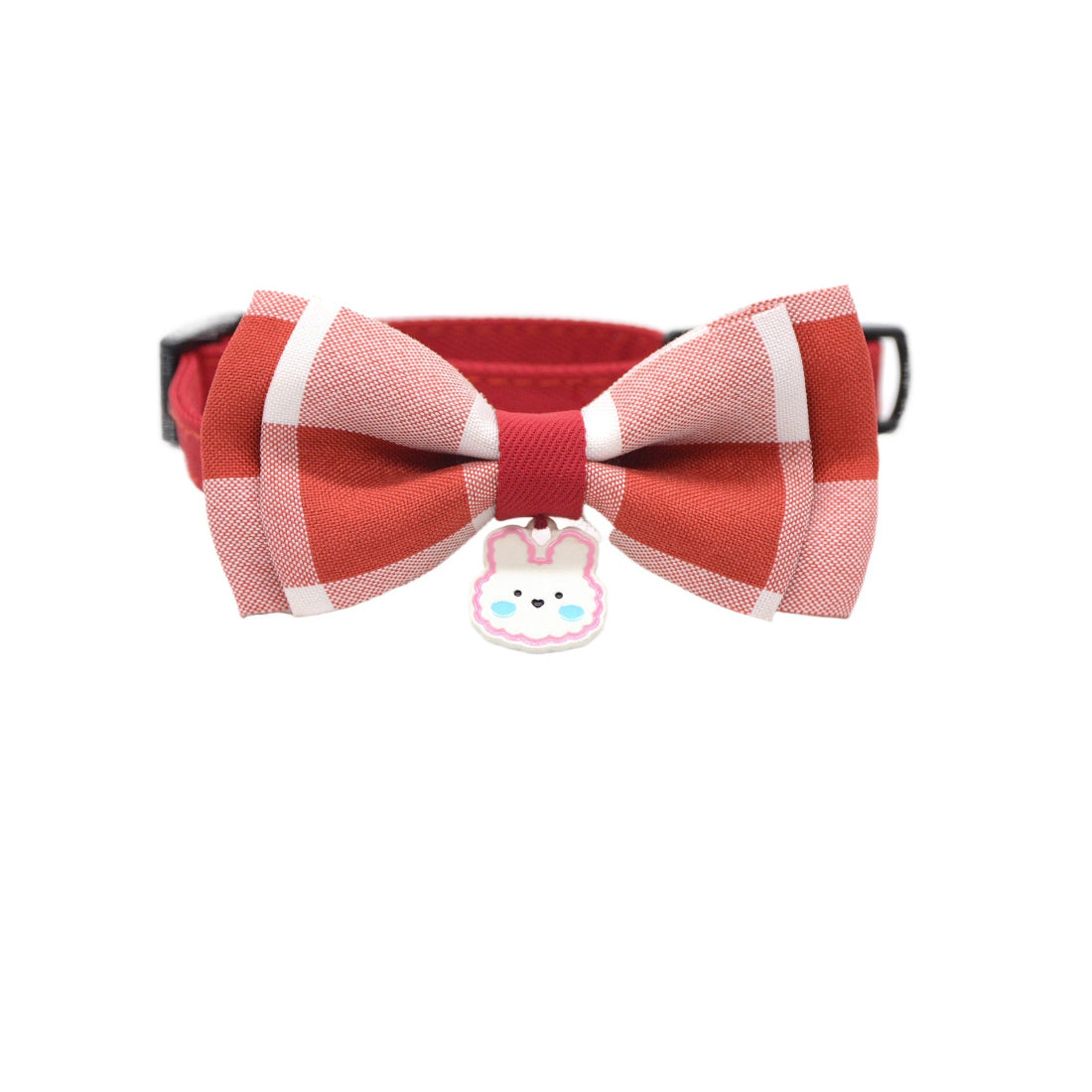 Close-up of silver bunny charm on pink breakaway cat collar