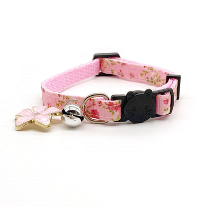 Adjustable Mokka floral cat collar showing buckle and bell details