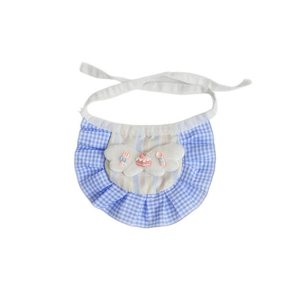 Mokka Cake Charm Cat Bib worn by a baby, showing fit and coverage