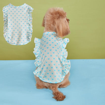 Close-up of ruffle detail on sleeve of white dog t-shirt with red heart print