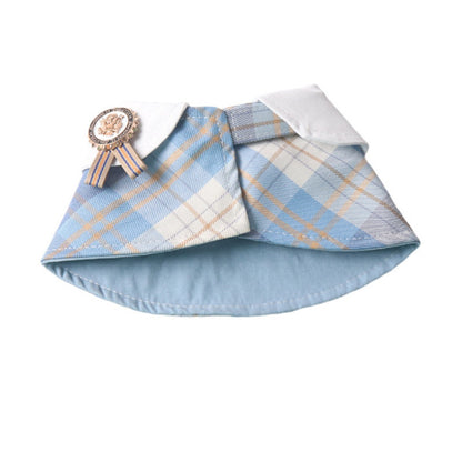 Back view of Mokka plaid rosette cape collar on a small dog