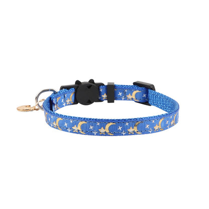Close-up of Mokka cat collar featuring moon and star pattern with attached bell
