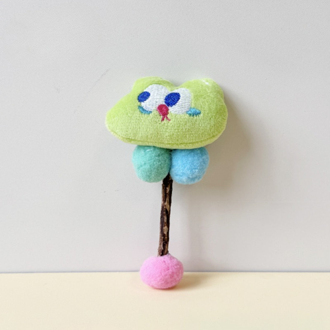 Top view of Moo animal plush cat toy showing overall shape and design