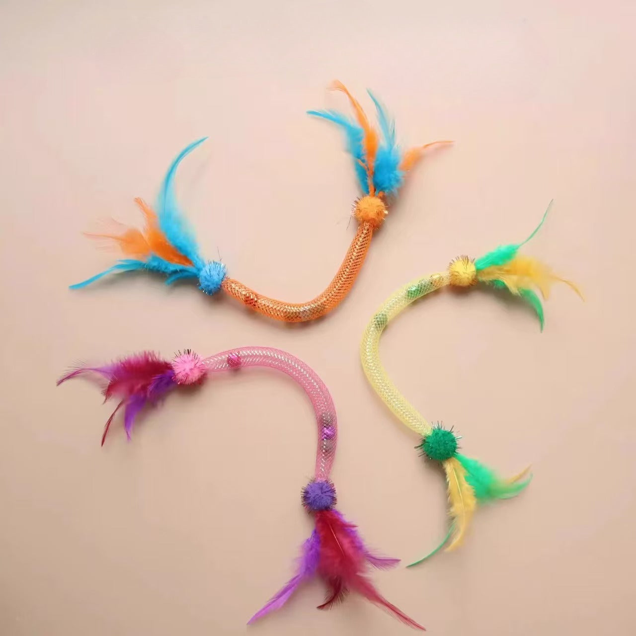 Moo Sparkle Feather Toss cat toy featuring bright feathers designed for cat play