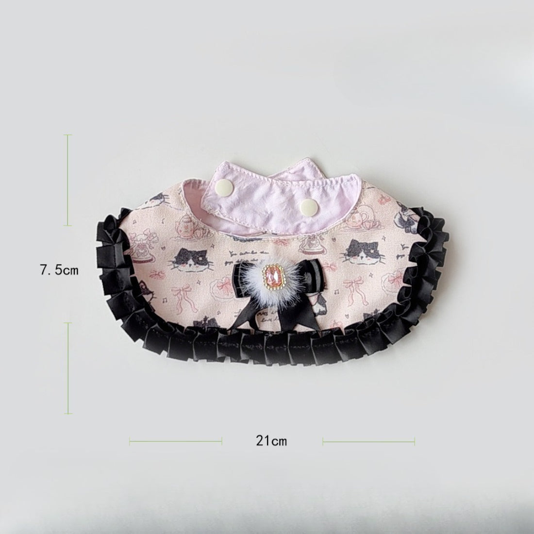 Back view of pink baby neck bib showing adjustable snap closure