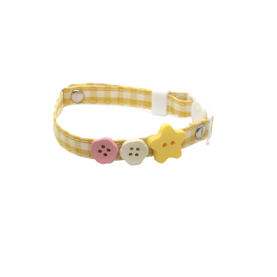 Pink adjustable breakaway cat collar with Mokka button charm in hand