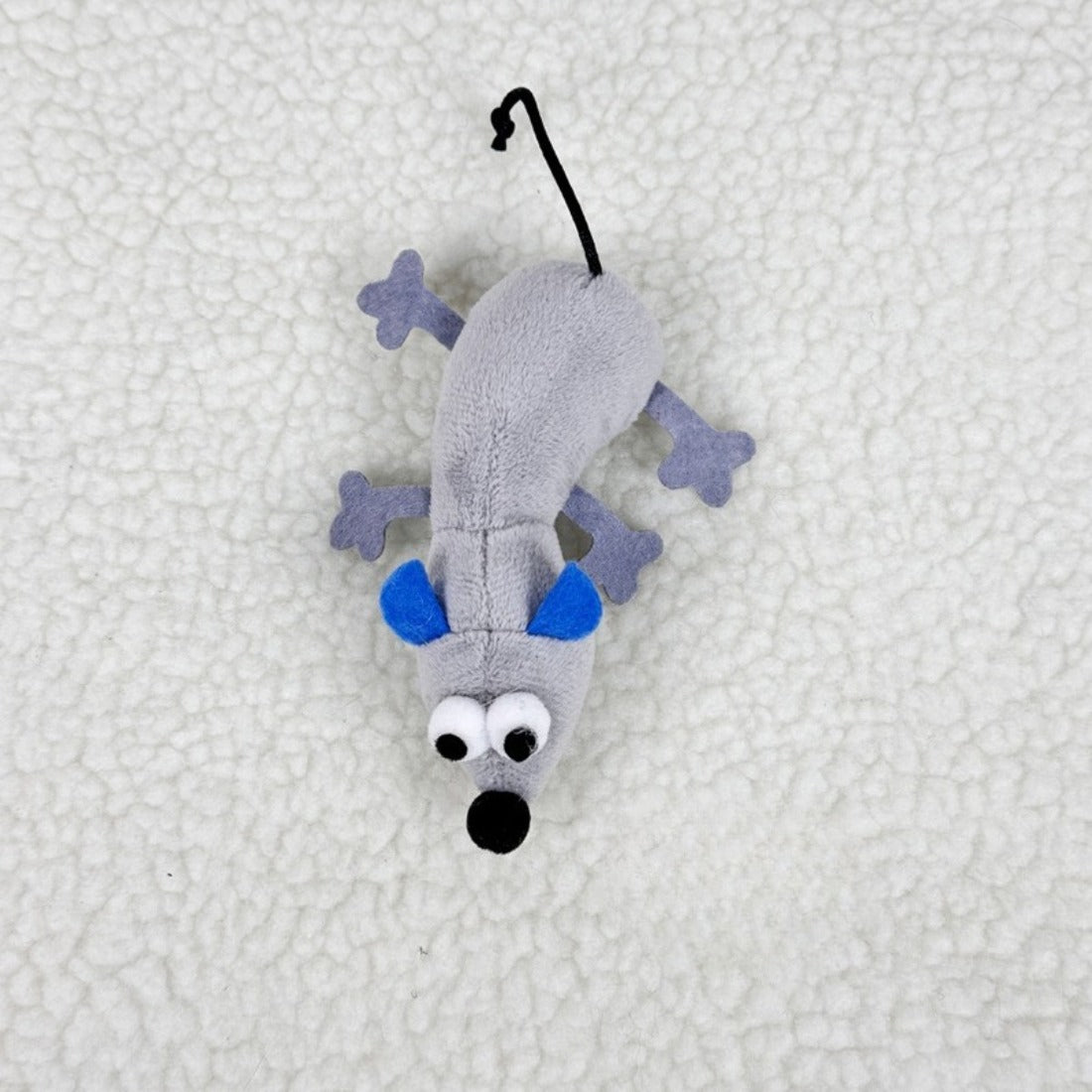 Side view of Moo mouse cat toy highlighting its soft plush material