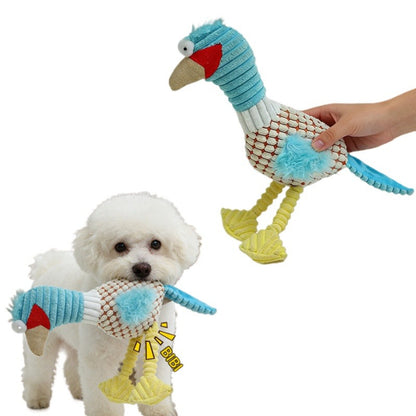 Close-up of Petkin duck plush dog toy showing soft yellow body and orange beak