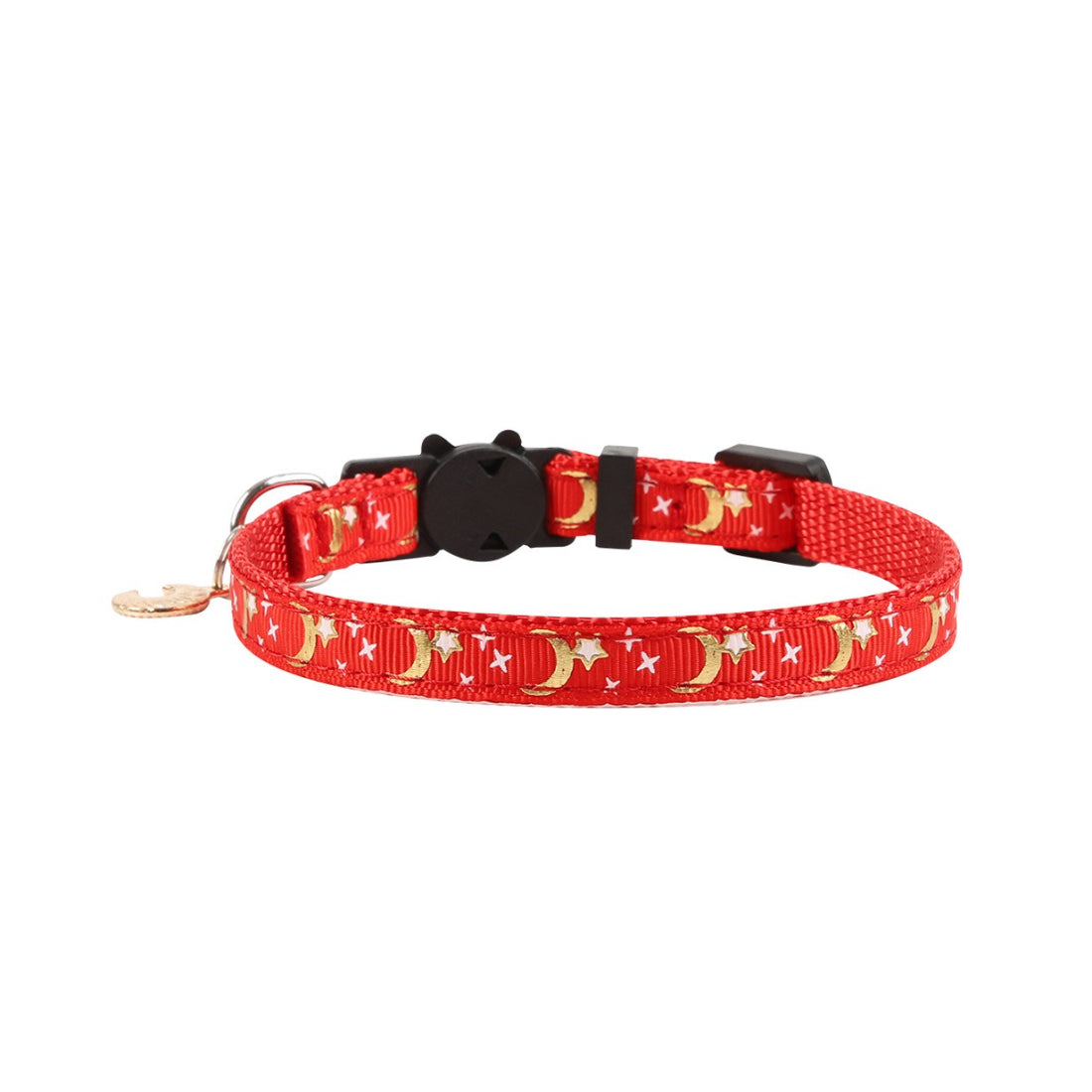 Mokka cat collar showing moon and star print and bell on a neutral surface