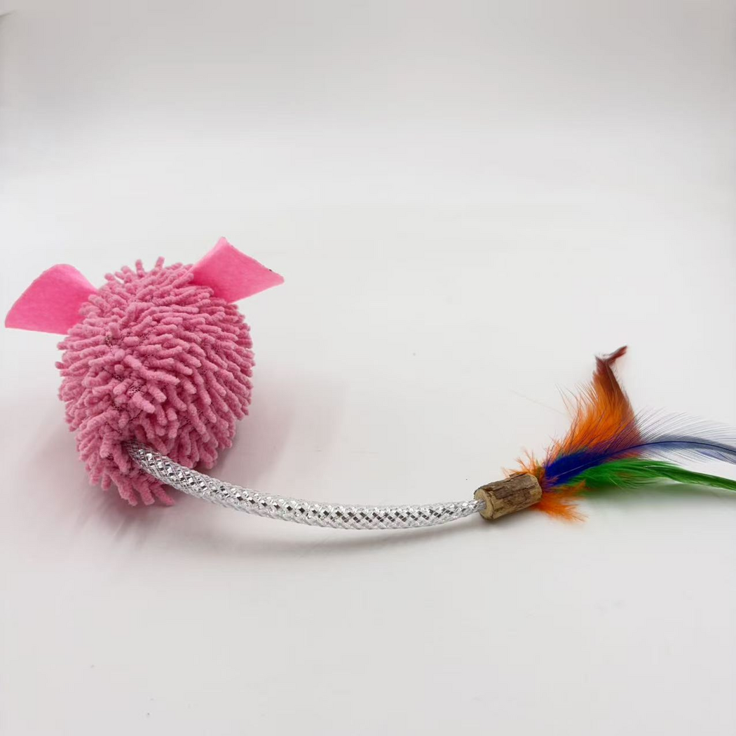 Rear detail of the pink mouse-shaped cat toy showing curved mesh tube, brown cylindrical connector and cropped feathers