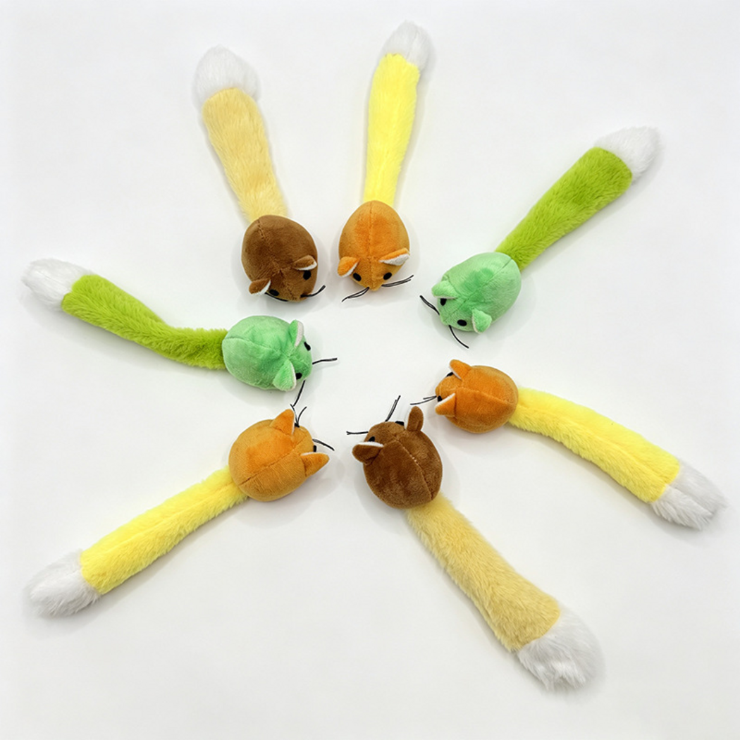 Green, Orange and Brown mouse-shaped cat toys viewed from above in a radial arrangement