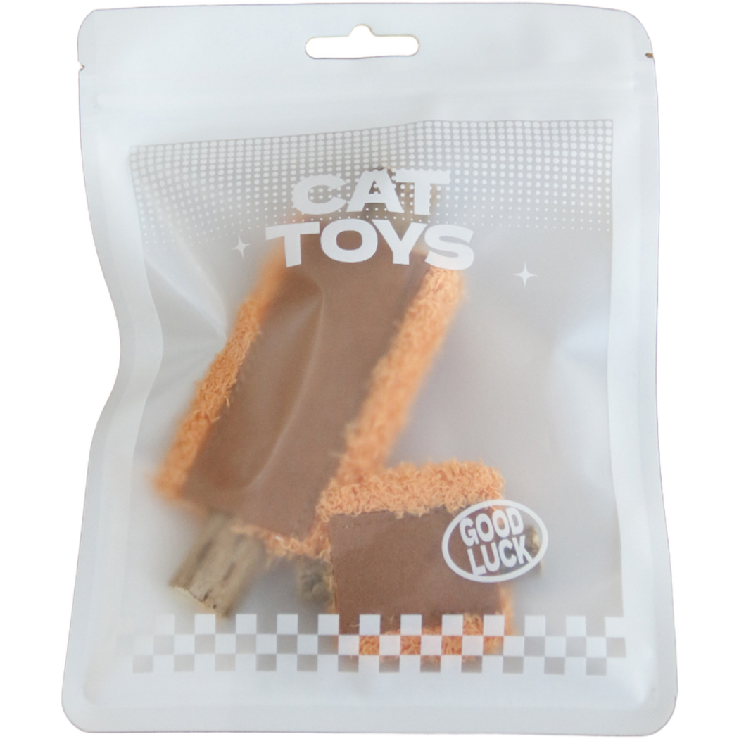 Orange cat toys visible inside a translucent pouch marked CAT TOYS and GOOD LUCK